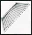 Twinwall polycarbonate glazing provides excellent light transmission and insulation.